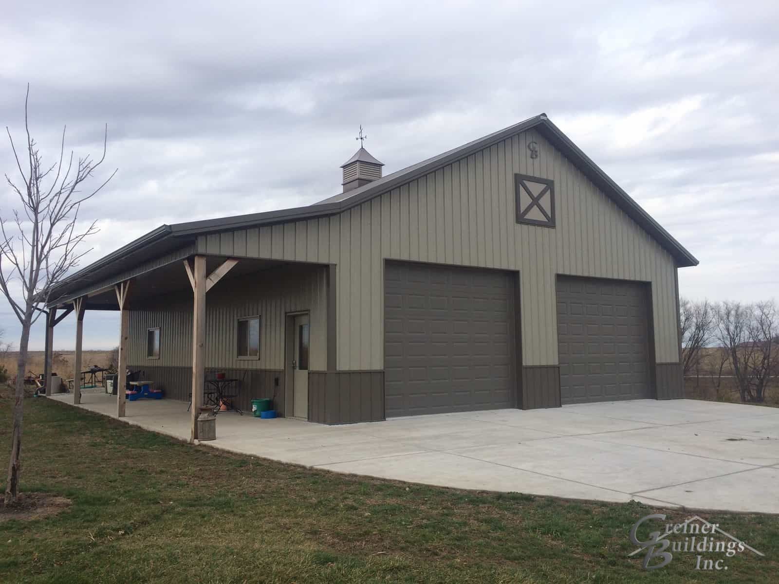 30’ wide x 40’ long x 12’ tall Metal Garage Workshop with a side porch are…