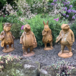SET OF 5 METAL CAST IRON WIND IN THE WILLOWS STATUES GARDEN .
