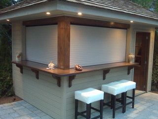 Talius Rollshutters installed out outdoors bar to provide security .