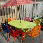 Colorful wrought iron patio set using multi color Rustoleum spray .