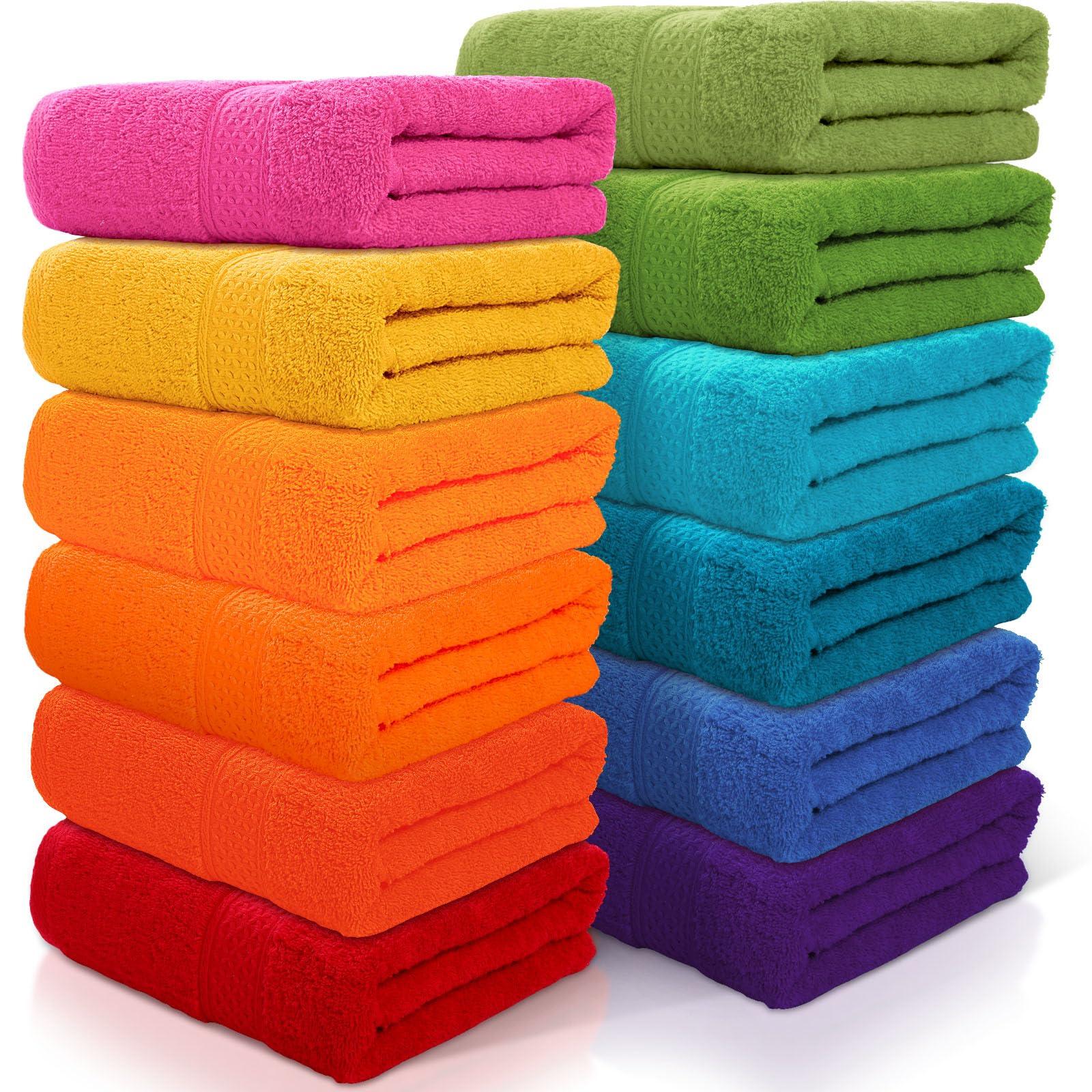 Colorful towels and accessories bring vibrancy to⁢ your bathroom