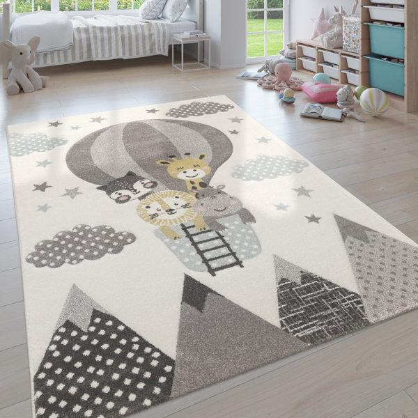 Use textured rugs to add warmth and comfort to your boy nursery