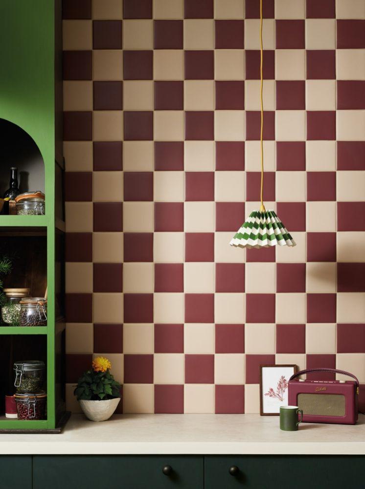 Opt for patterned backsplash tiles to enhance your Burgundy Kitchens visual appeal