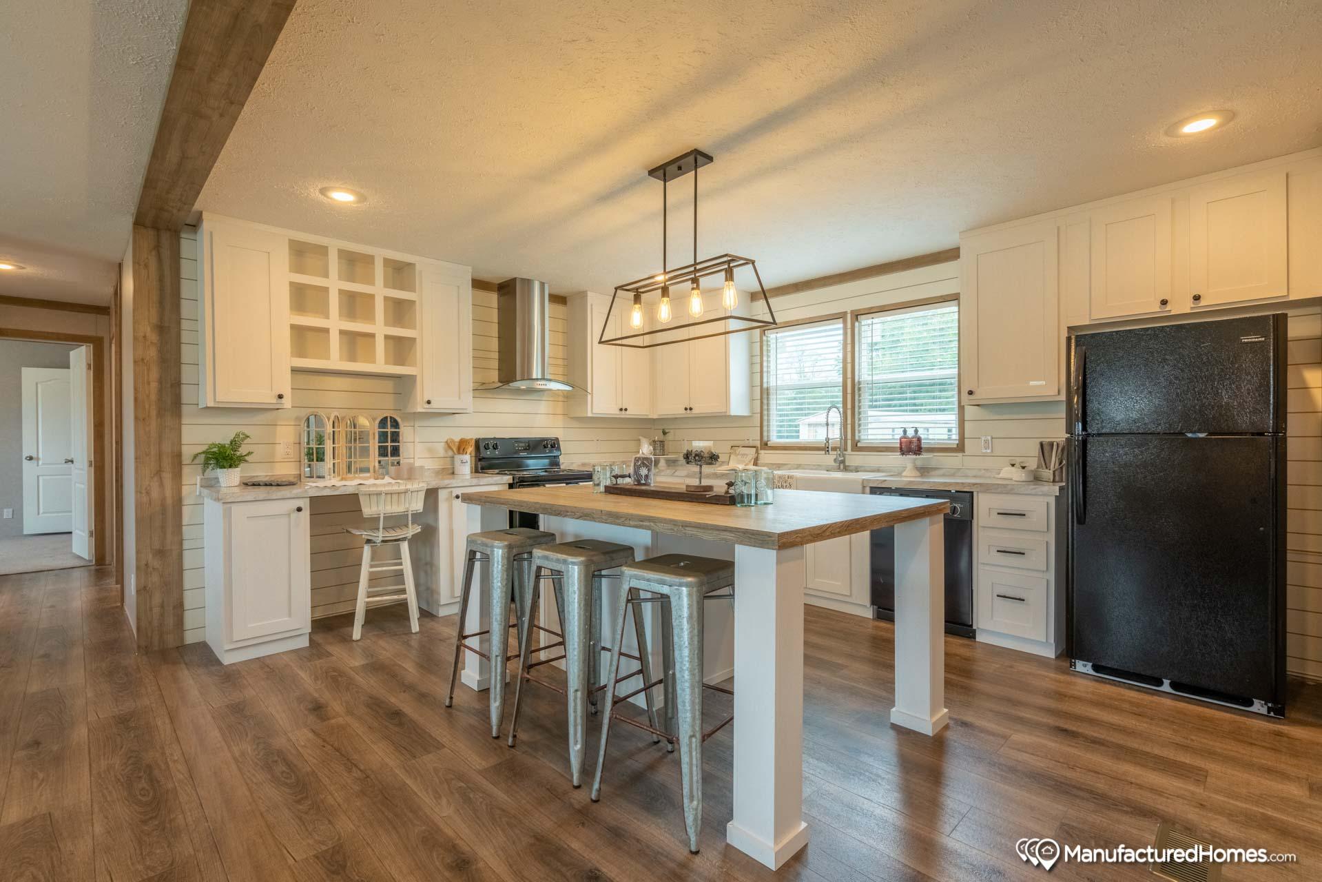 A gentle breeze through farmhouse kitchen windows creates a refreshing atmosphere