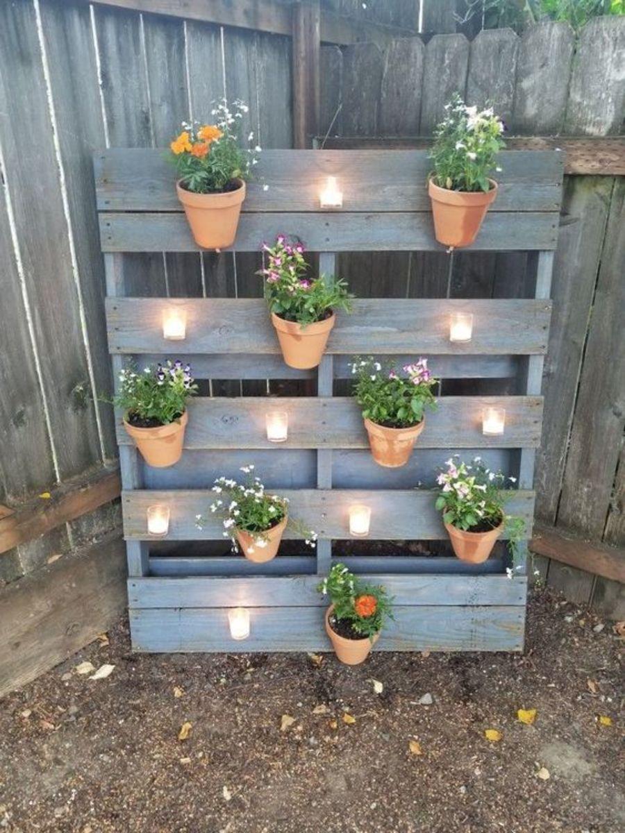 Fashion a quirky⁤ pallet​ garden⁣ tea station filled with ‍fragrant blooms