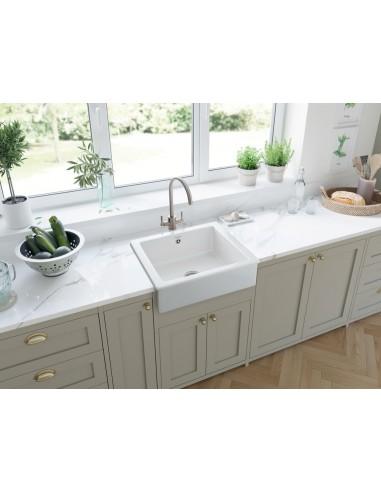 Farmhouse kitchen sinks, like apron-front styles, blend style with practicality beautifully