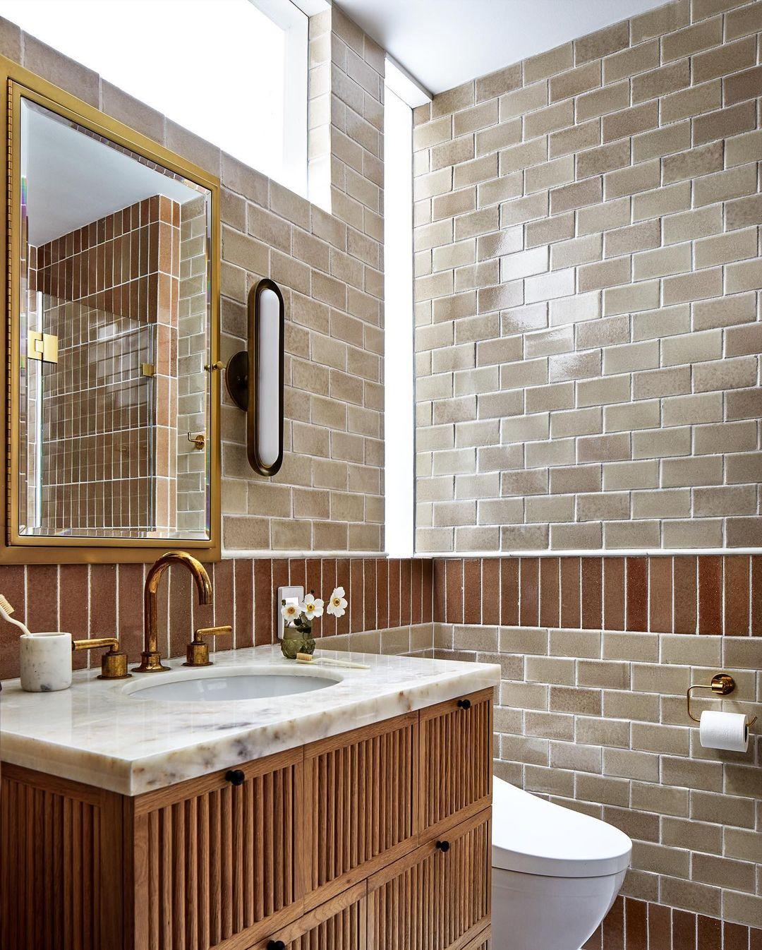 Use mismatched tiles to enhance an eclectic bathroom vibe