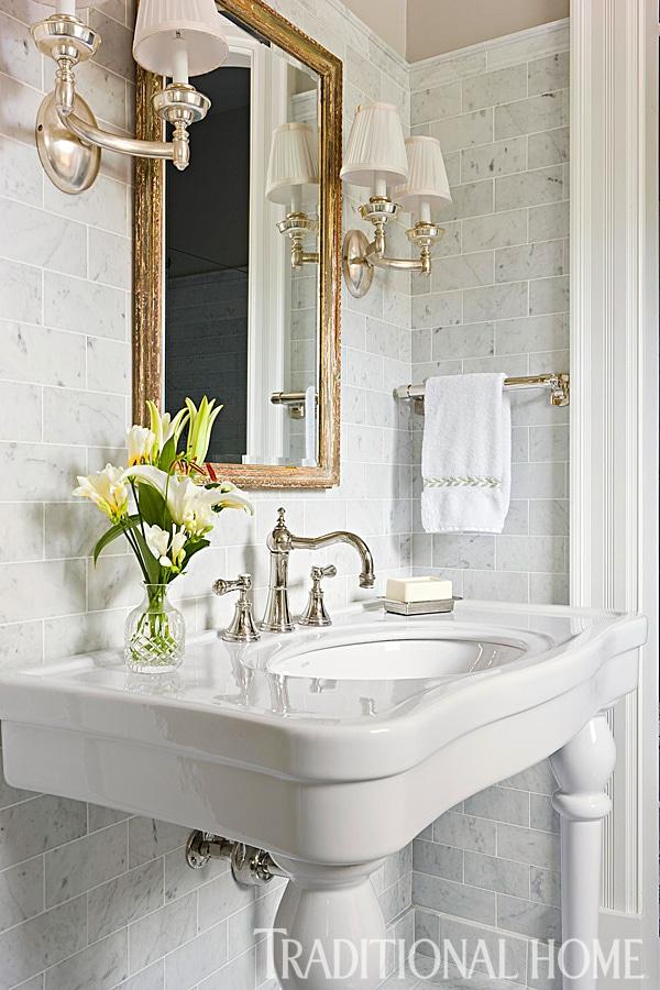 Vintage mirrors reflect style in charming farmhouse bathrooms