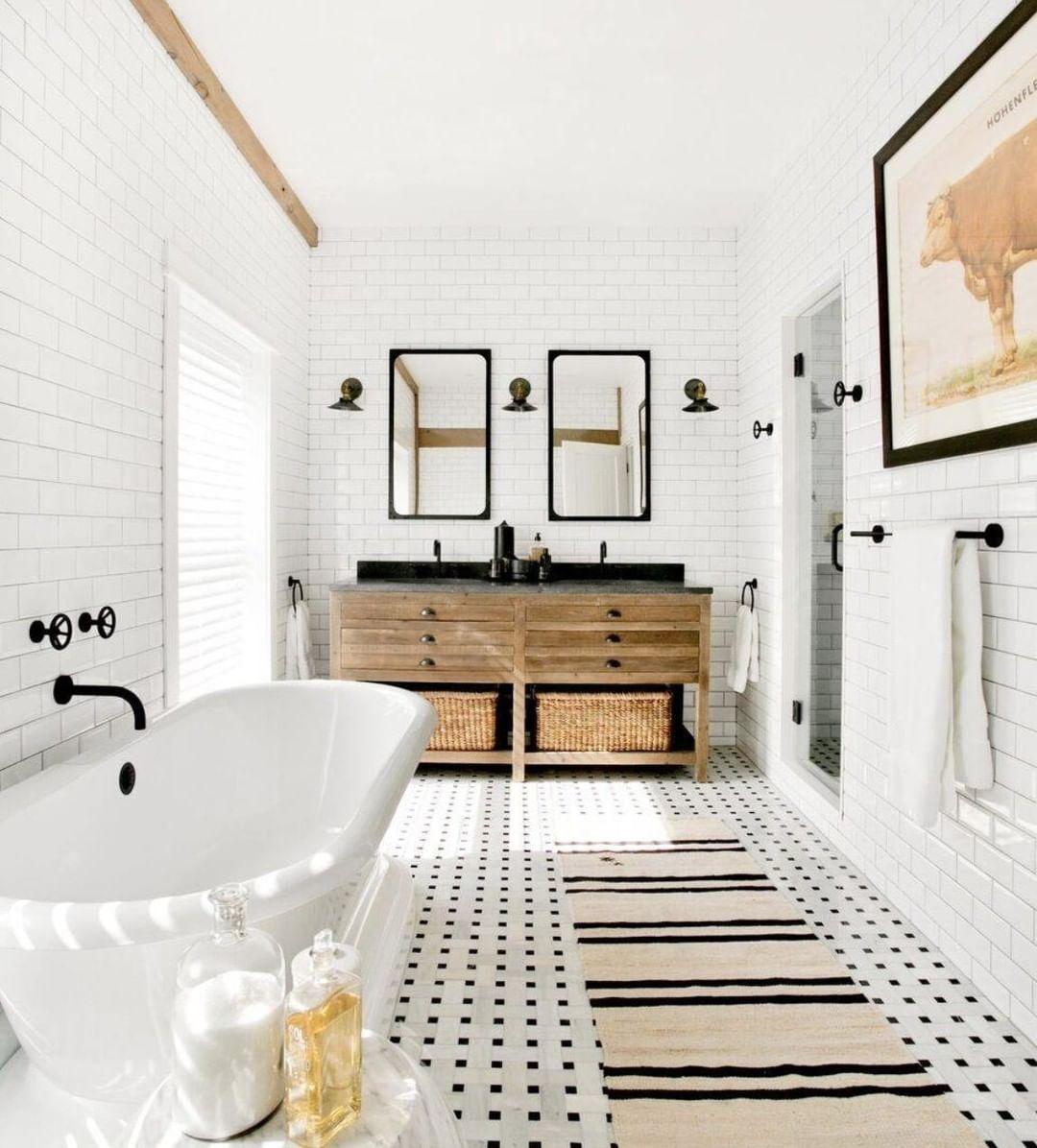 Patterned tiles create visual interest in ‌farmhouse bathrooms