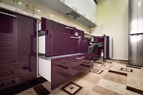 Create a monochromatic scheme using varying shades of burgundy in your kitchen