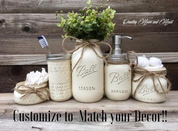 Mason jar storage keeps essentials organized in farmhouse bathrooms