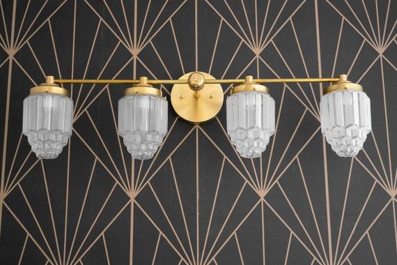 Artistic lighting fixtures⁢ set the mood in your bathroom