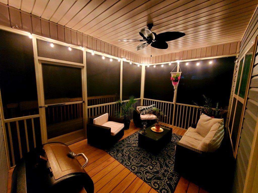 Soft, ambient lighting to create a tranquil atmosphere in your screened porch