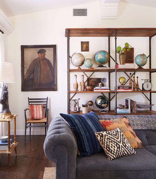 Use bookshelves‍ creatively to ⁣showcase⁢ collectibles in ‌your​ eclectic living⁤ room