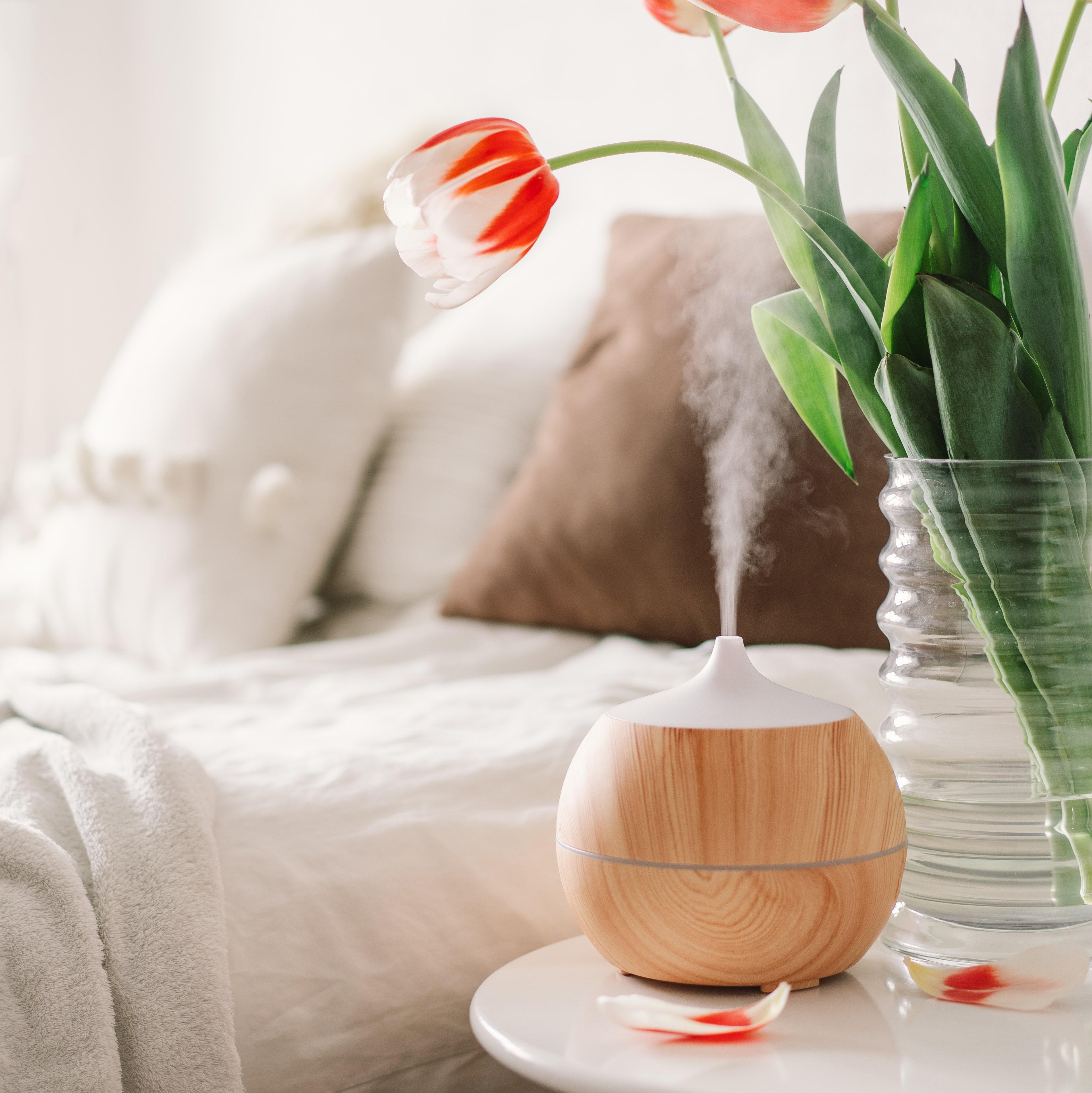 Incorporate ‍an essential oil diffuser for a soothing ⁢aroma in‌ minimalist bedroom