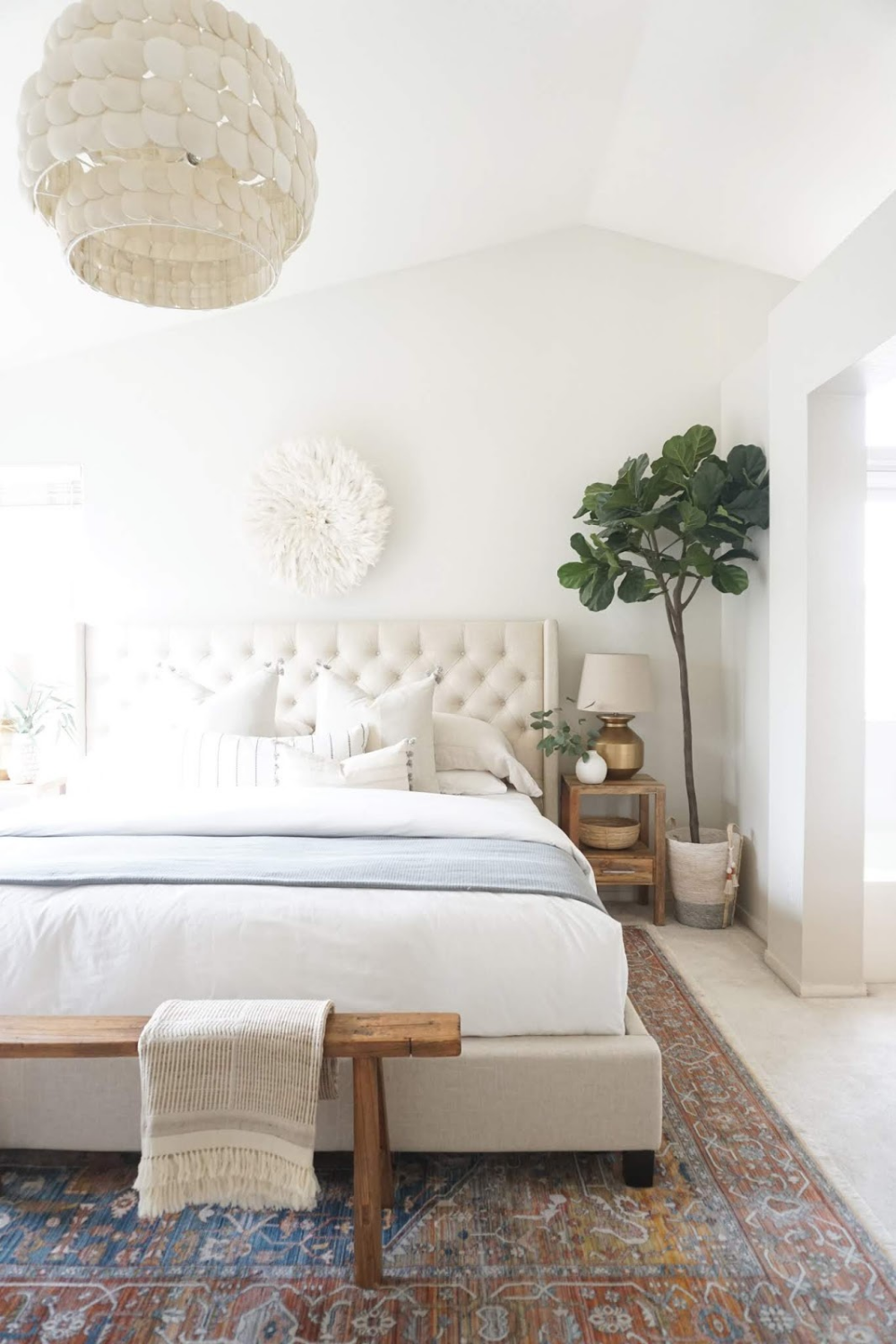 Style a bedroom with tufted bed