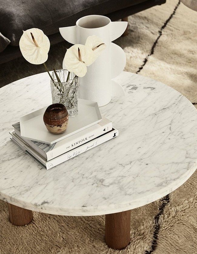 Create a unique area in the house with
marble coffee tables