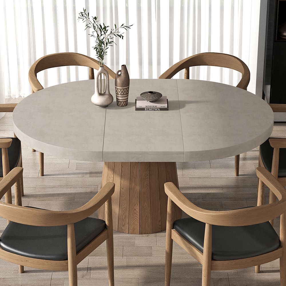 Enhance your kitchen with some round
  dining room tables