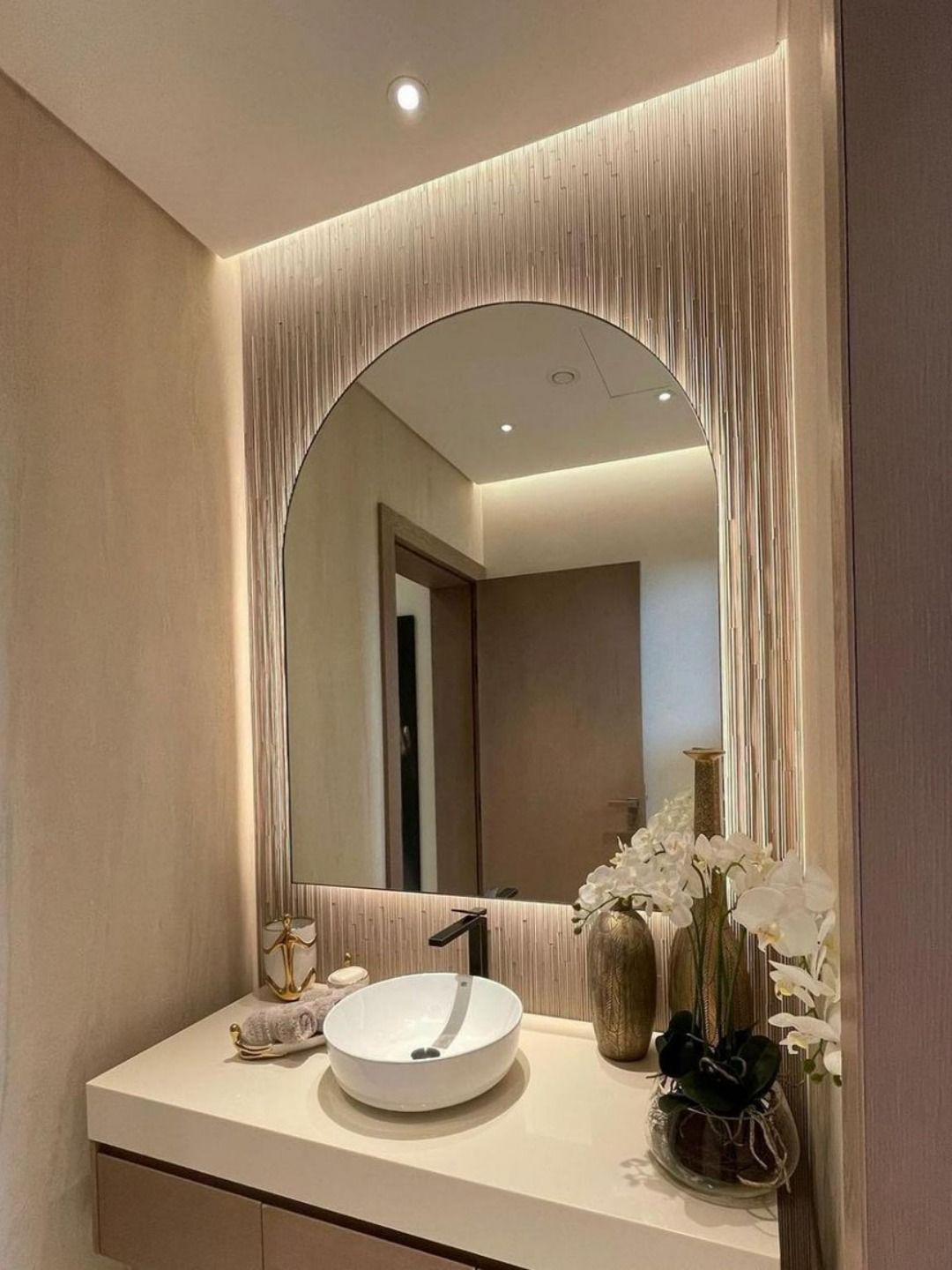 Boost ambiance with bathroom mirror
lights