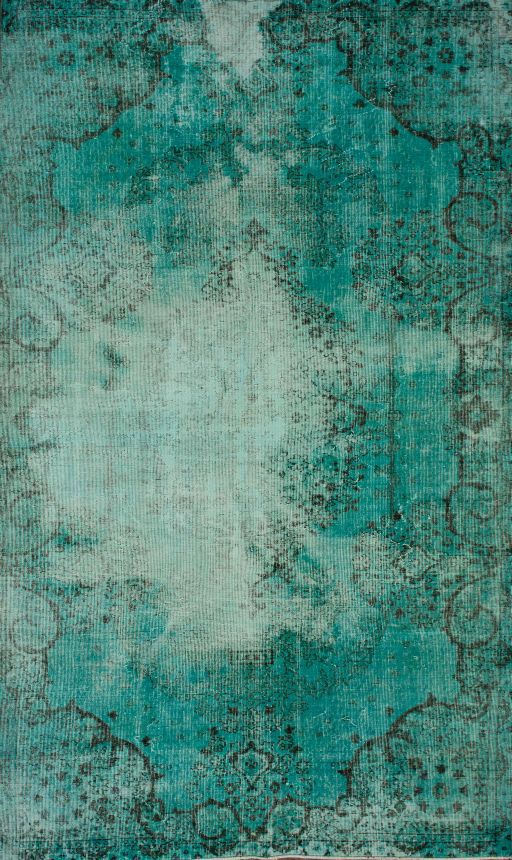 Turquoise rug- a vibrant color for room
  décor