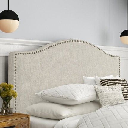 Give a royal look to bedroom with a king
  headboard