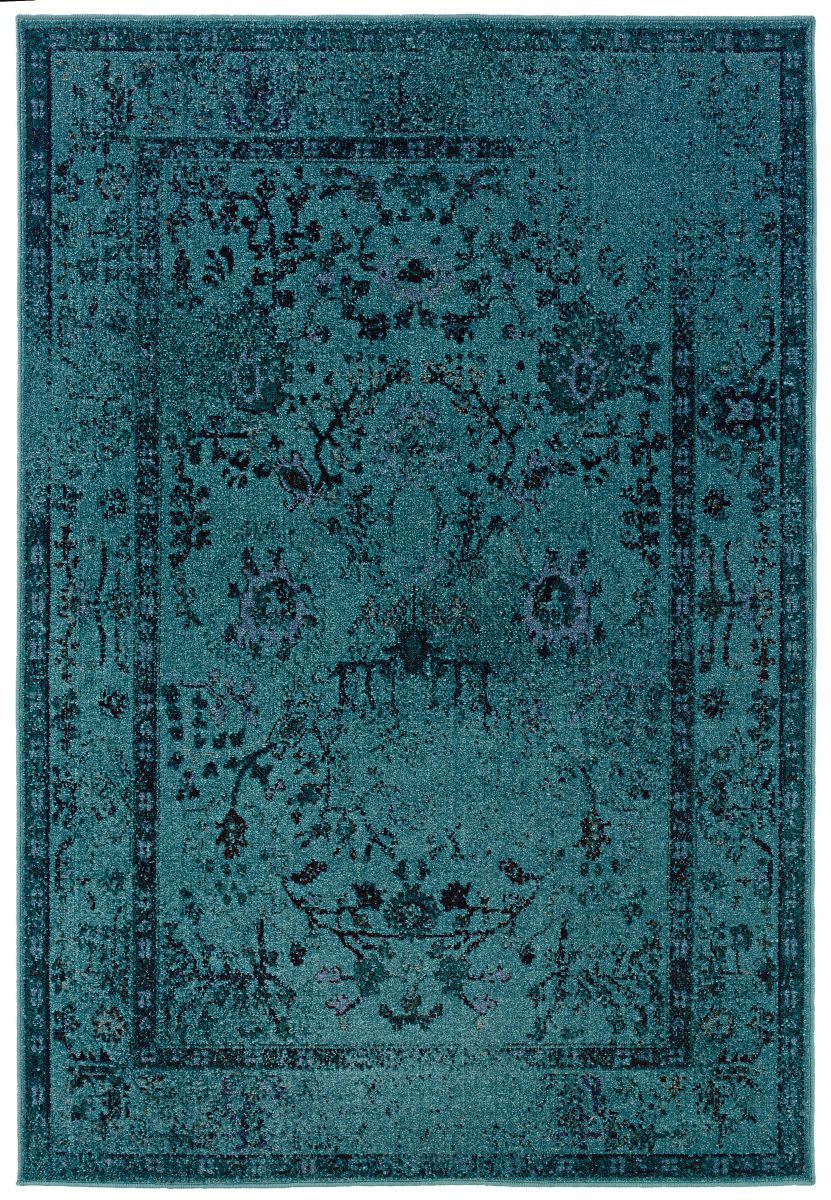 Turquoise rug- a vibrant color for room
décor
