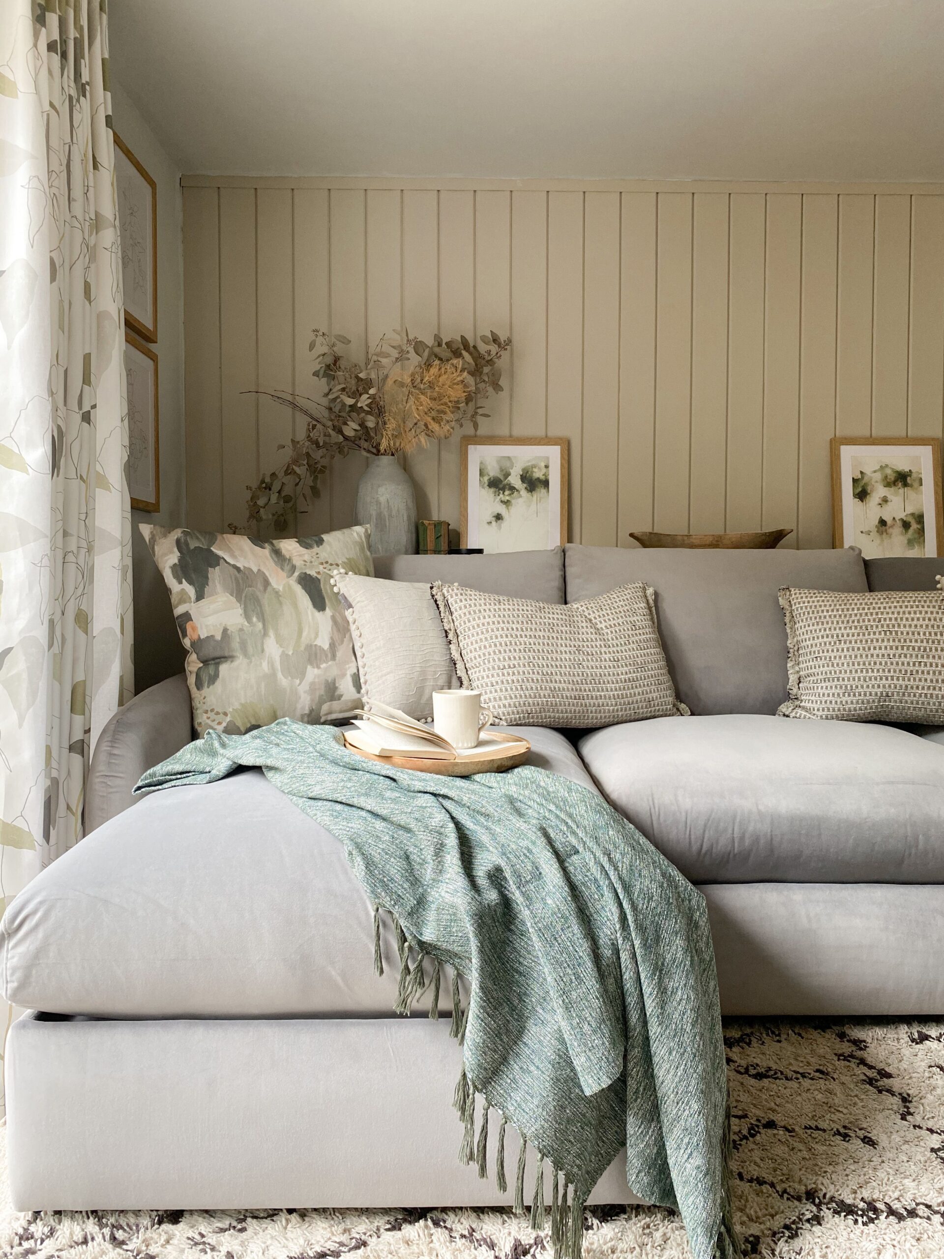 Buy a small corner sofa to get a bigger
look of the room