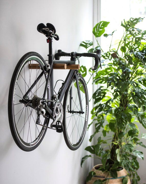 Innovative Storage Solution: Bike Mounted
Vertically on Wall