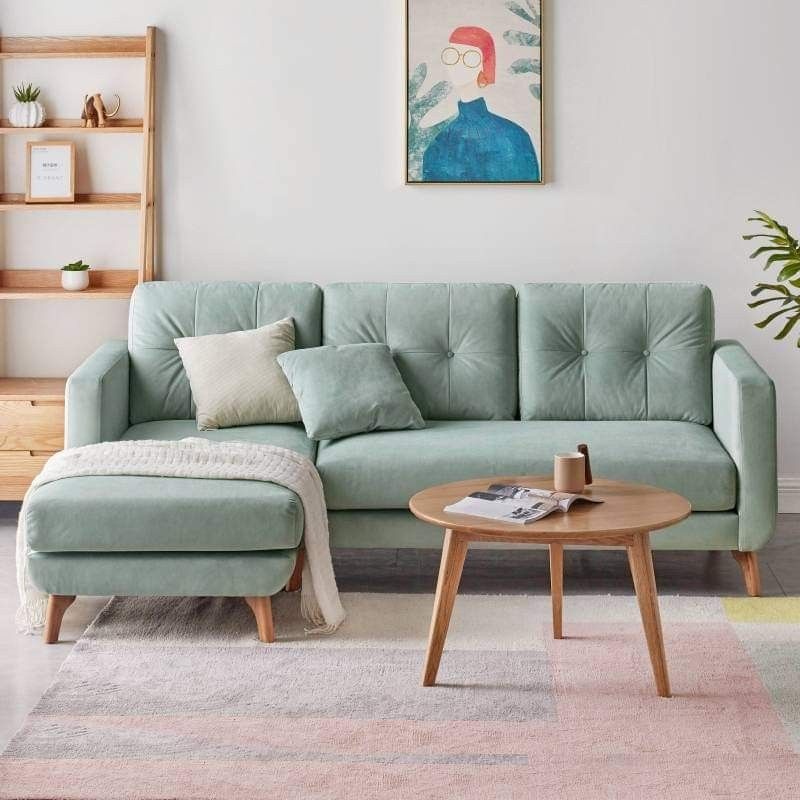 Buy a small corner sofa to get a bigger
  look of the room