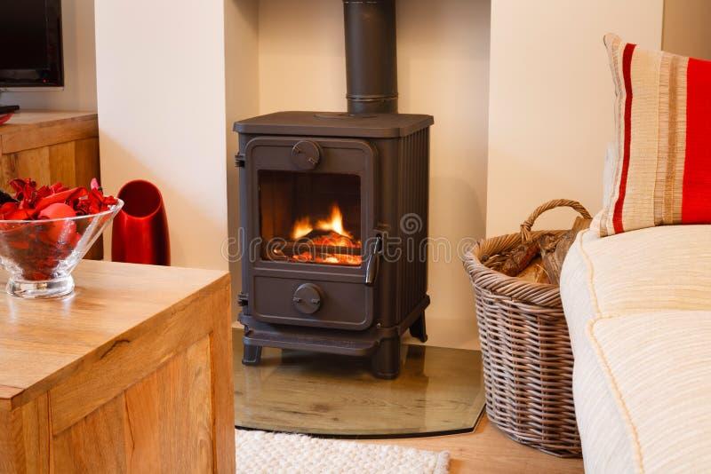 Incorporate a fireplace‍ or⁢ wood ‍stove ⁤for warmth in⁣ your earthy living room