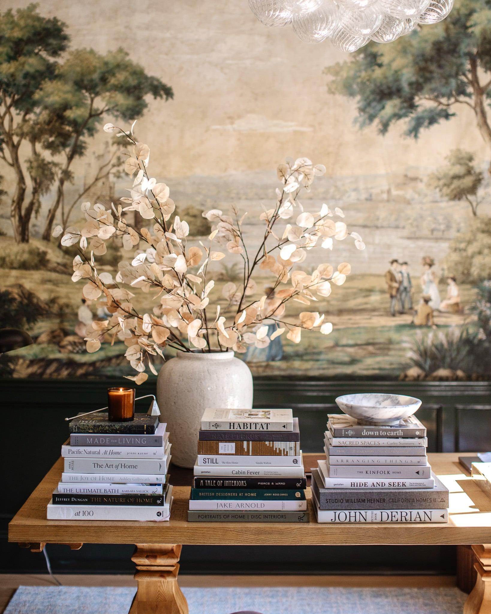 Display a collection of nature-themed books on ‌your living room coffee table