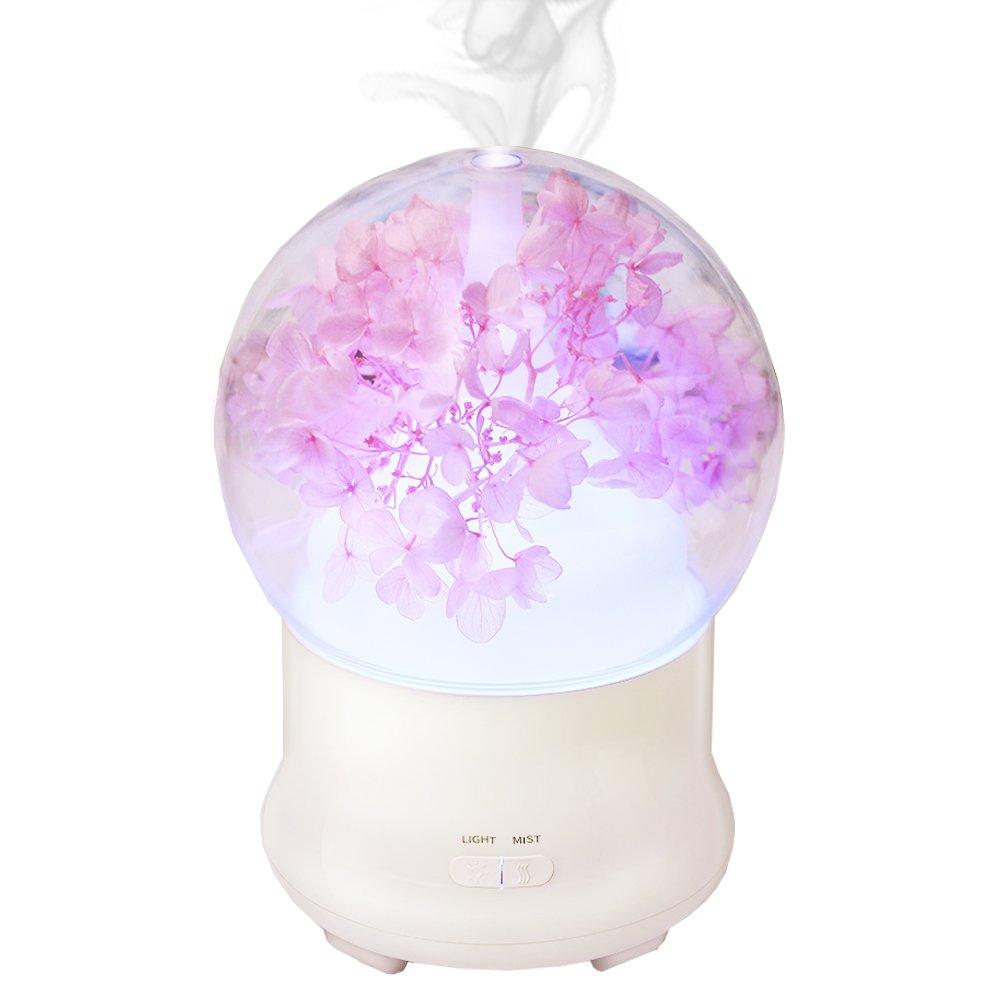 A calming essential oil diffuser for relaxation in your teen girl bedroom