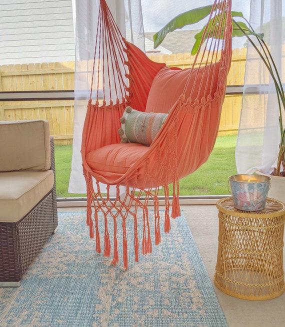 A comfy ⁣hammock chair‌ for laid-back lounging in your Boho Living Room