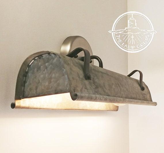 Rustic lighting fixtures brighten up farmhouse bathrooms⁤ beautifully