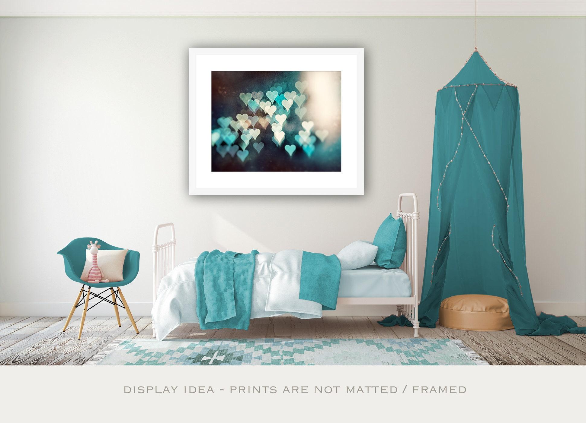 Showcase personal artwork on walls to express individuality in your teen ​girl bedroom