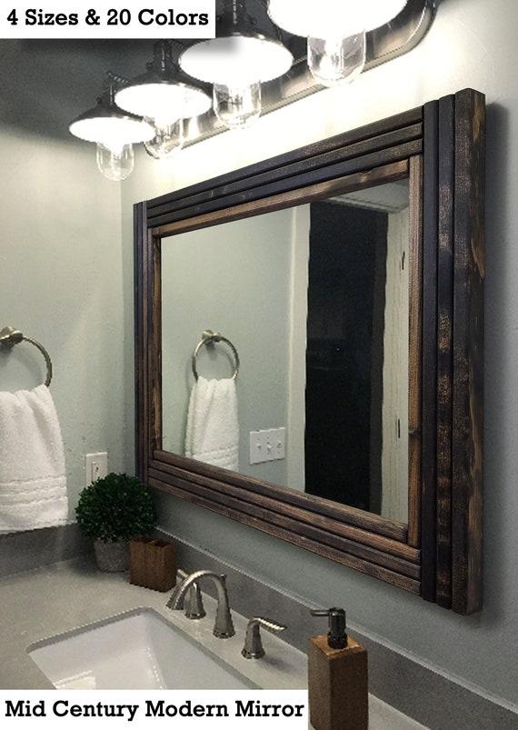 Choose an oversized mirror to enhance your⁢ eclectic bathroom’s visual⁤ appeal