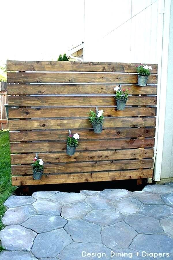 Enhance privacy by arranging a pallet garden ‌as a natural screen