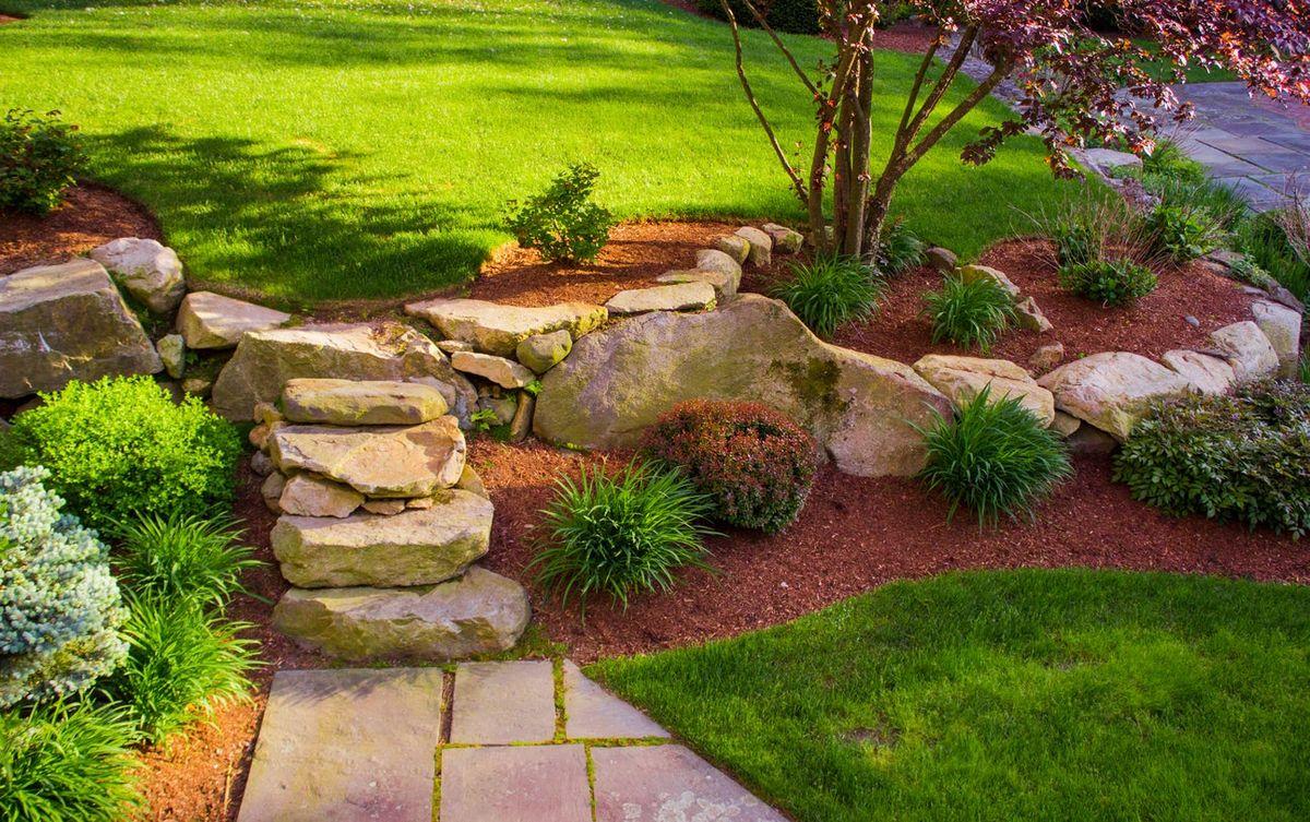 Add decorative boulders to your Front Yard Landscaping for a touch of rugged elegance