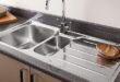 a stainless steel kitchen sink with granite worktop JKZAVGL
