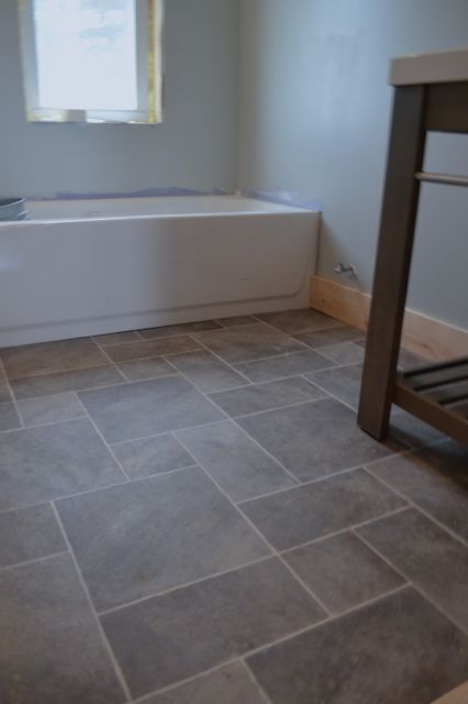 bathroom flooring ideas barn bathroom laminate floor2 -- i want this vinyl flooring in my renovated RPPAQCO