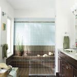 bathroom remodeling ideas bathroom with contemporary double vanity and brown tiles QLCWFEO