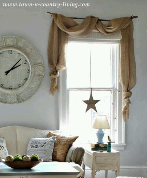 burlap curtains country decorating style in a farmhouse family room CXMTWZH
