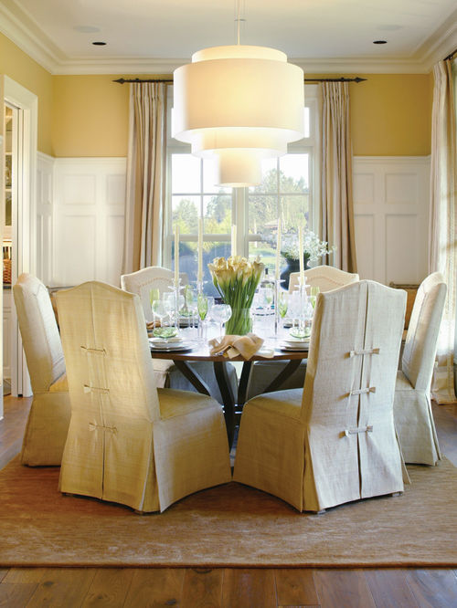 dining room chair covers traditional dining room idea in portland with yellow walls and dark  hardwood XHVVISJ