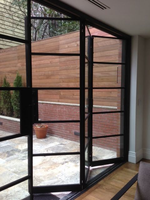 folding doors portella projects: manhattan brown stone - steel bi-fold and steel f.. KNUADKV