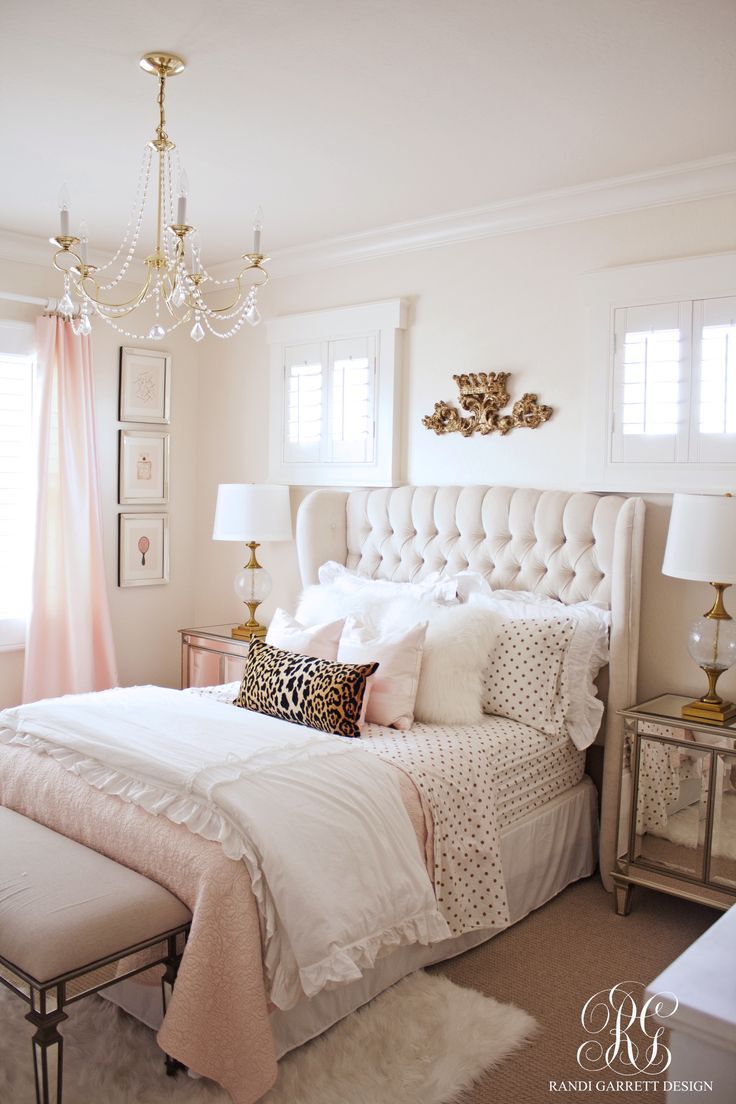 girl bedroom ideas pink and gold bedroom featuring tufted wingback headboard by randi garrett  design IAGFGNO