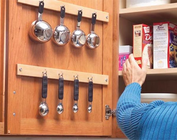 kitchen storage ideas 33. use the inside of your cabinet doors to store smaller utensils. 34 YZDXCPZ