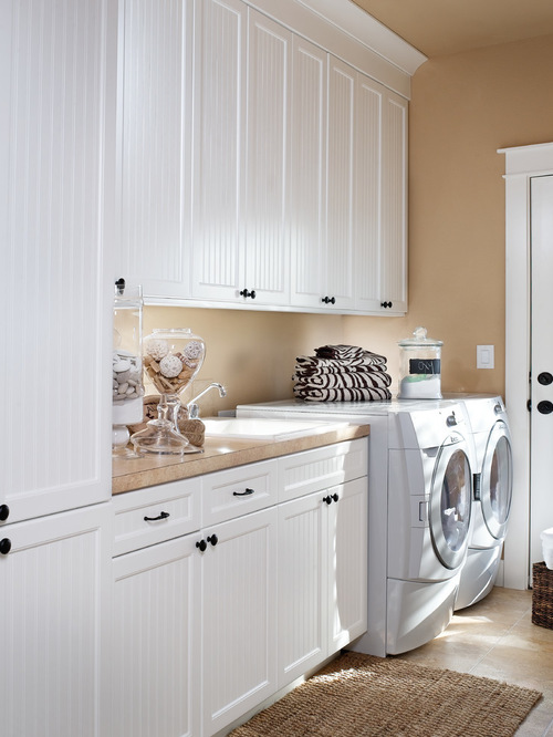 laundry room cabinets traditional laundry room idea in portland with white cabinets WGBQMXC