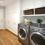 laundry room cabinets traditional laundry room idea in san francisco with white cabinets VUNVTPK