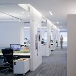 modern office great lighting and walls add privacy to the workspace YGMPKTI