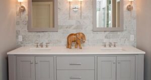 refined llc: exquisite bathroom with freestanding gray double sink vanity  topped with KKFXEQM